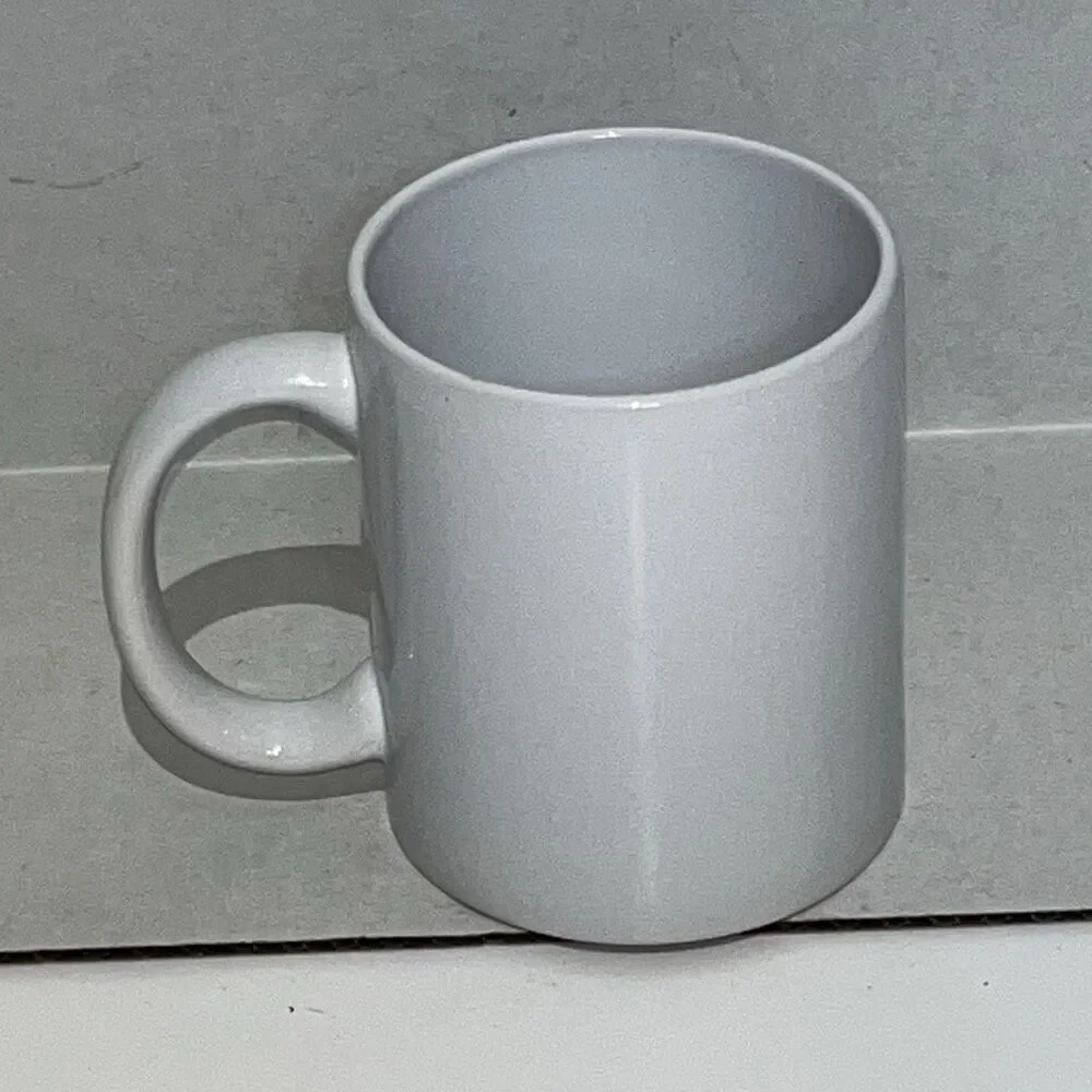 Modern Gourmet Foods White Ceramic Flora and Fauna Herbology‎ Hogwarts Crest Mug